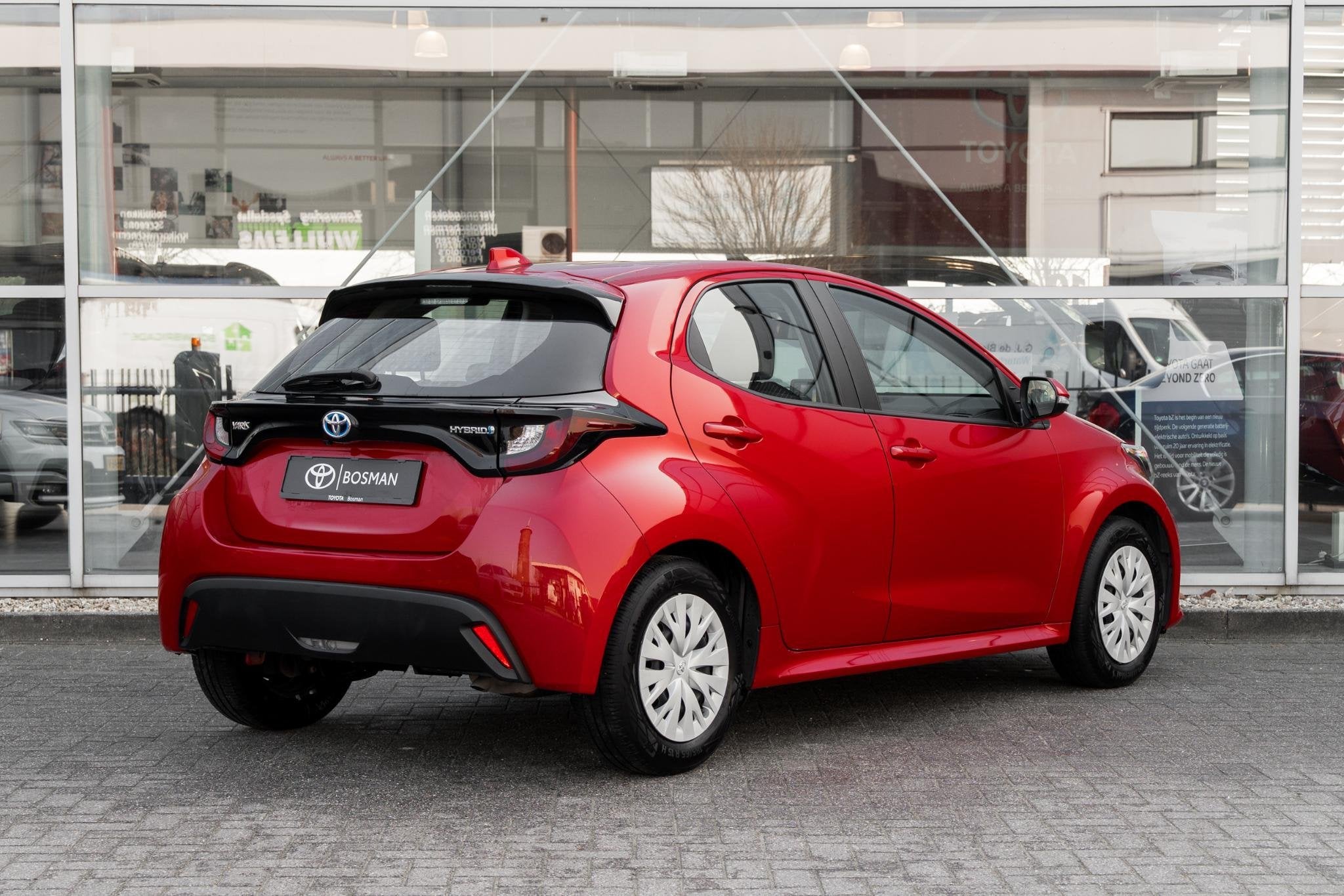 Toyota Yaris 1.5 Hybrid Active Navi, Auto's, Stof, Gebruikt, Euro 6, Automatische klimaatregeling