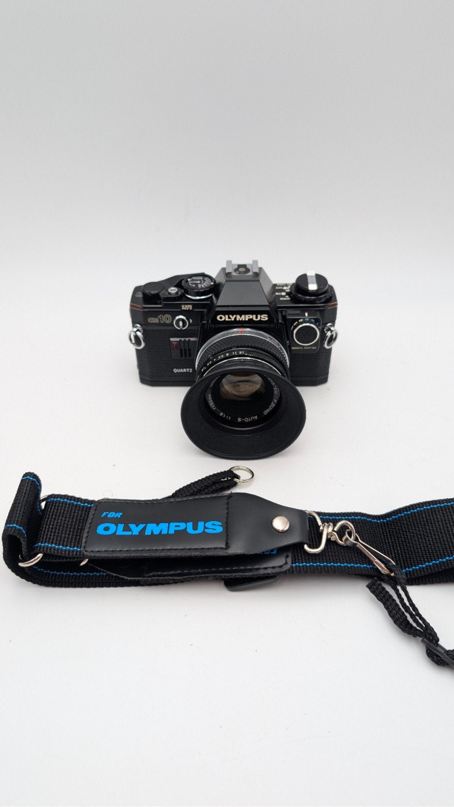 Olympus OM10 incl manual adapter en veel originelaccessoires, Ophalen of Verzenden, Spiegelreflex, Olympus