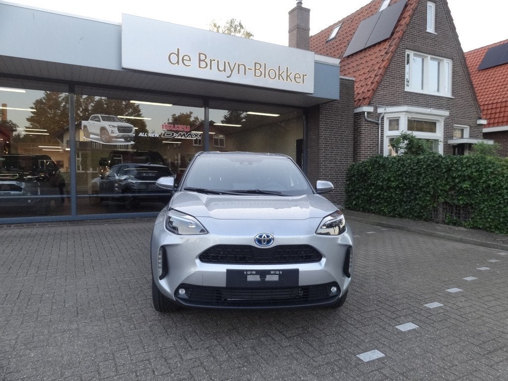 Toyota Yaris Cross 1.5 Hybrid 130pk Dynamic + Comfort Pack d, Stof, Gebruikt, 24 maanden, 1490 cc