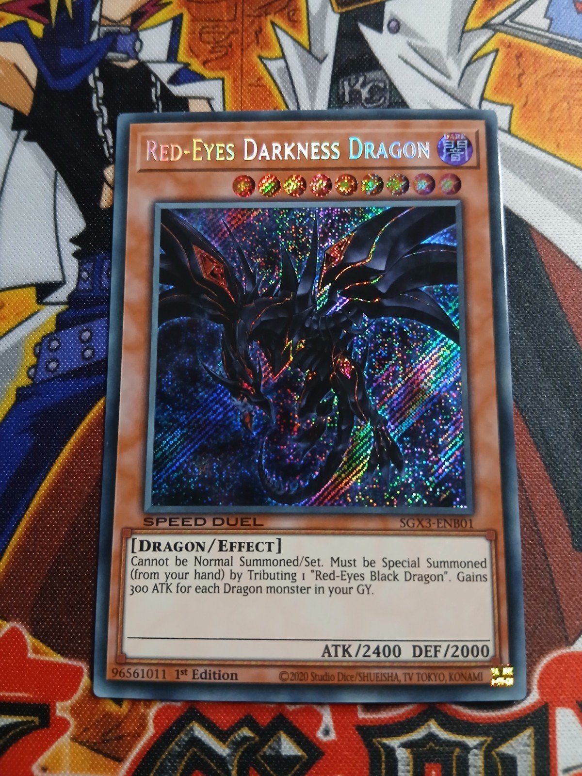Red-Eyes Darkness Dragon - Secret Rare SGX3 - Yu-Gi-Oh, Ophalen of Verzenden, Zo goed als nieuw, Foil