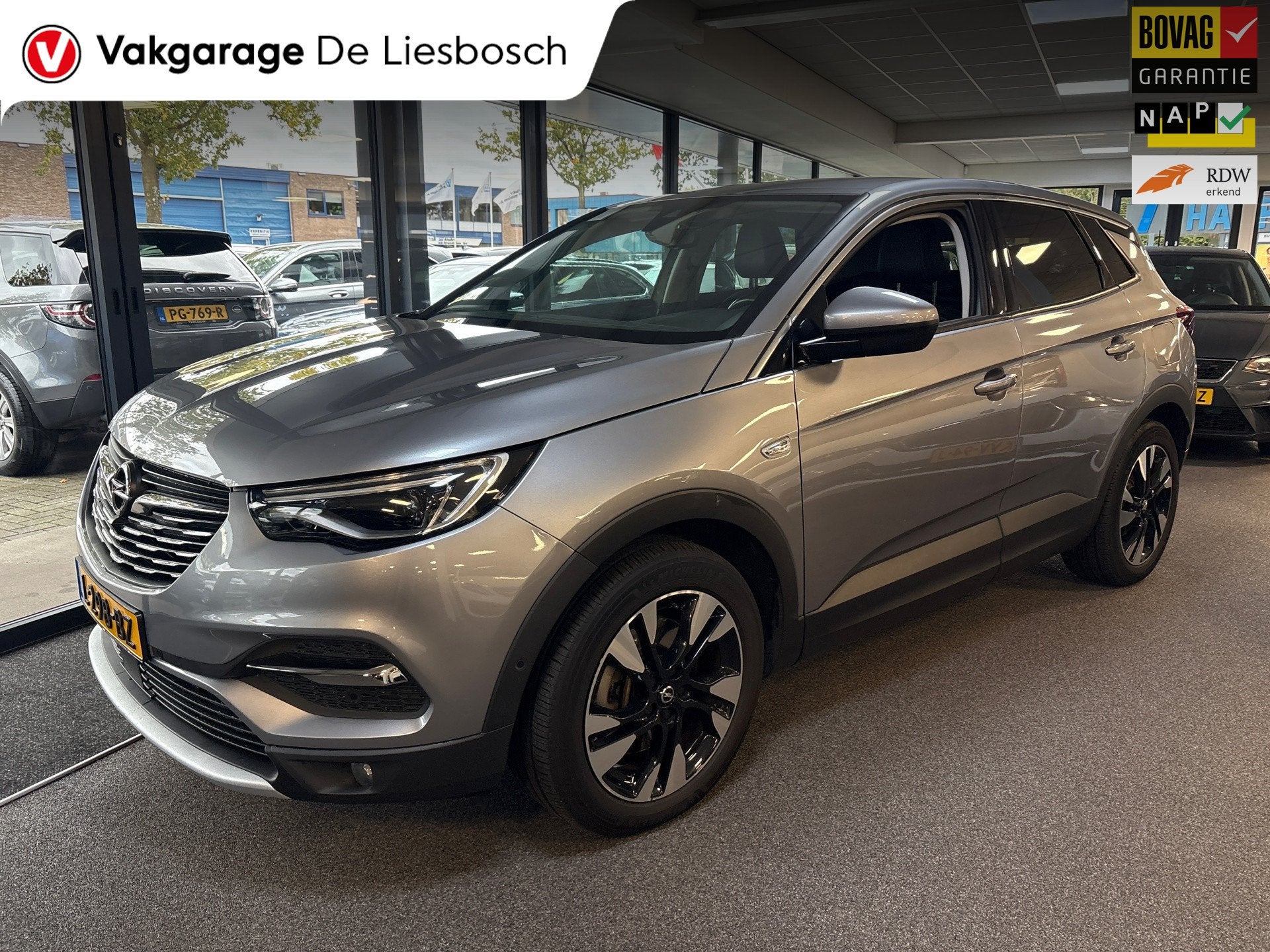 Opel Grandland X 1.6 Turbo Hybrid Business Elegance/navi/cam, Auto's, Stof, 4 cilinders, Bedrijf, Verwarmde buitenspiegels