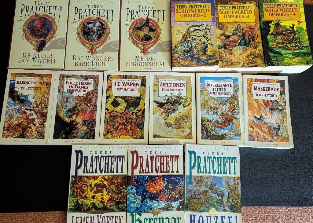 Terry Pratchet - Schijfwereld 1-21, Boeken, Verzenden, Zo goed als nieuw