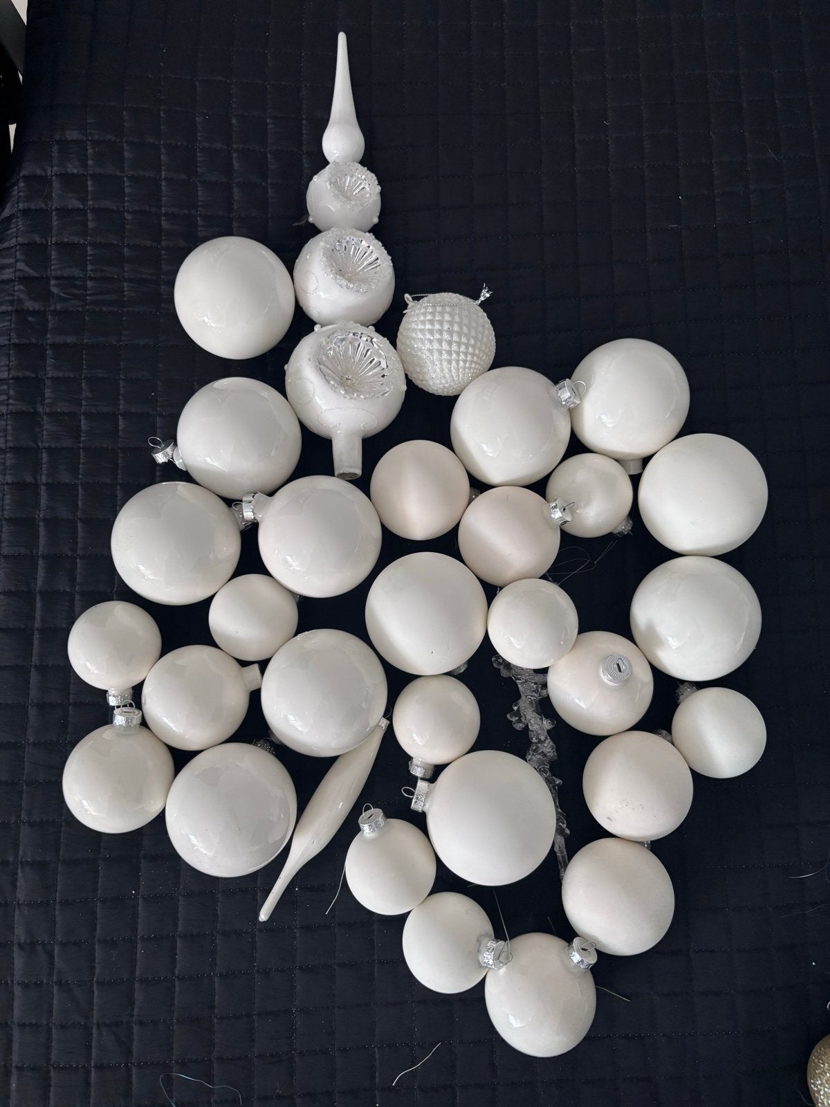 Kerstballen en piek wit, Ophalen
