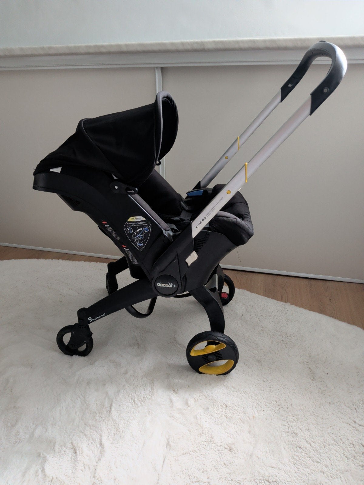 Doona+ autostoel en kinderwagen in één, Autogordel of Isofix, Gebruikt, Zijbescherming, 0 t/m 13 kg
