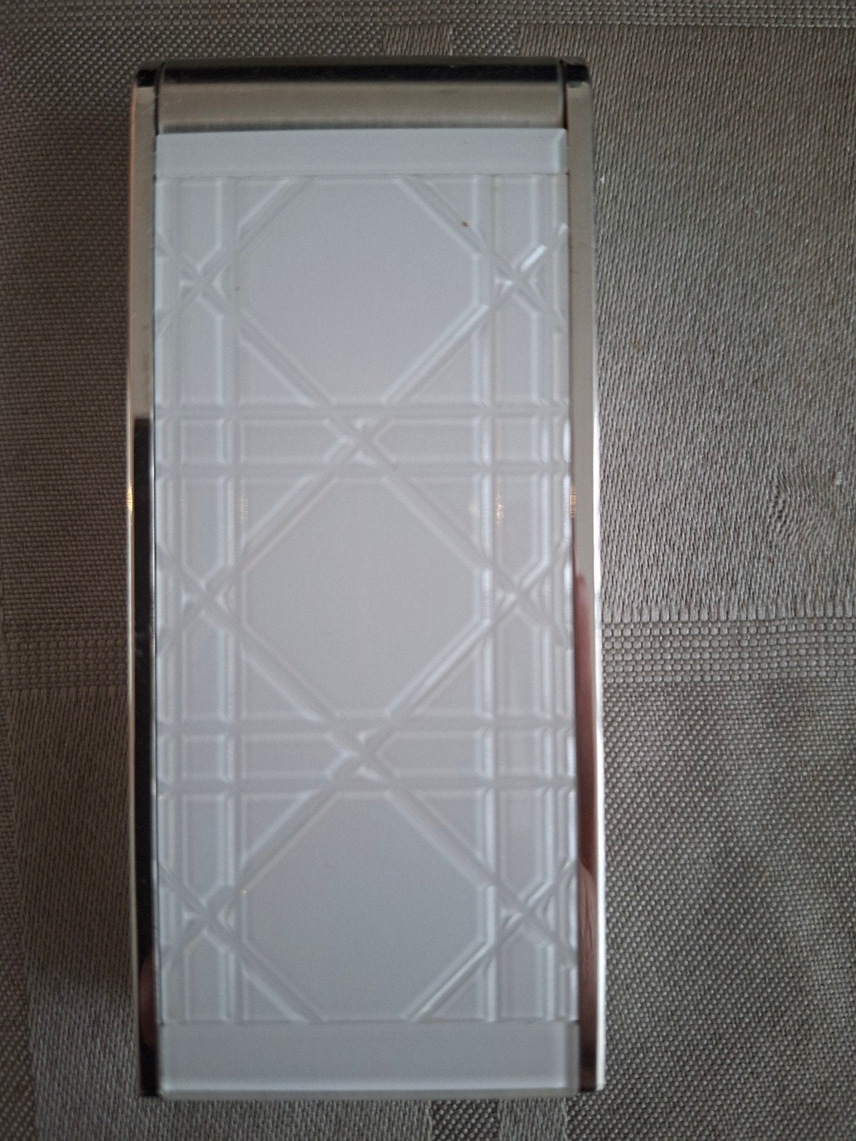 christion Dior mobiel, Ophalen