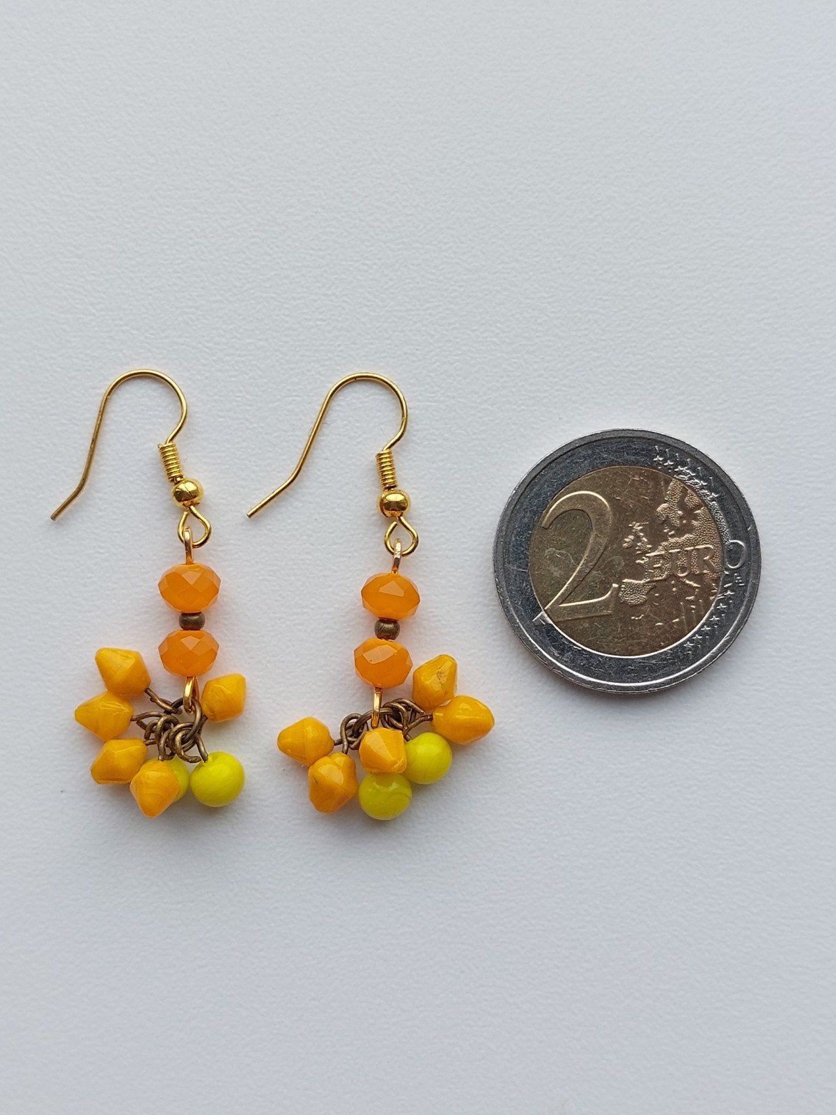 oorbellen, Sieraden, Tassen en Uiterlijk, Oorbellen, Ophalen of Verzenden, Oranje, Overige materialen