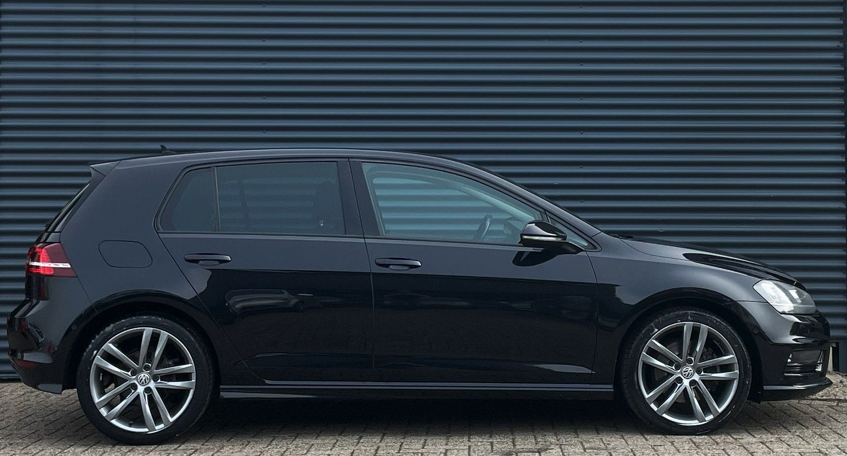 Volkswagen Golf 1.4 TSI 140PK R-Line DSG, Gebruikt, 4 cilinders, Leder en Stof, Zwart
