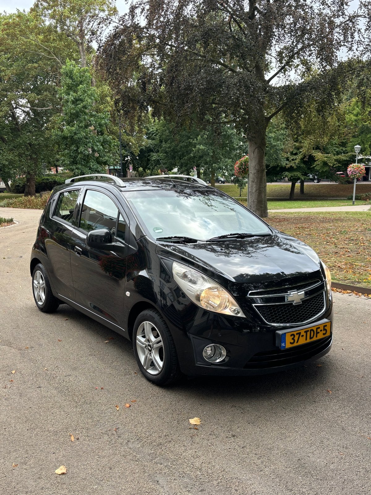 Chevrolet Spark 1.0 Bifuel 2012 Zwart, Auto's, 15 km/l, 37 €/maand, 4 cilinders, Zwart
