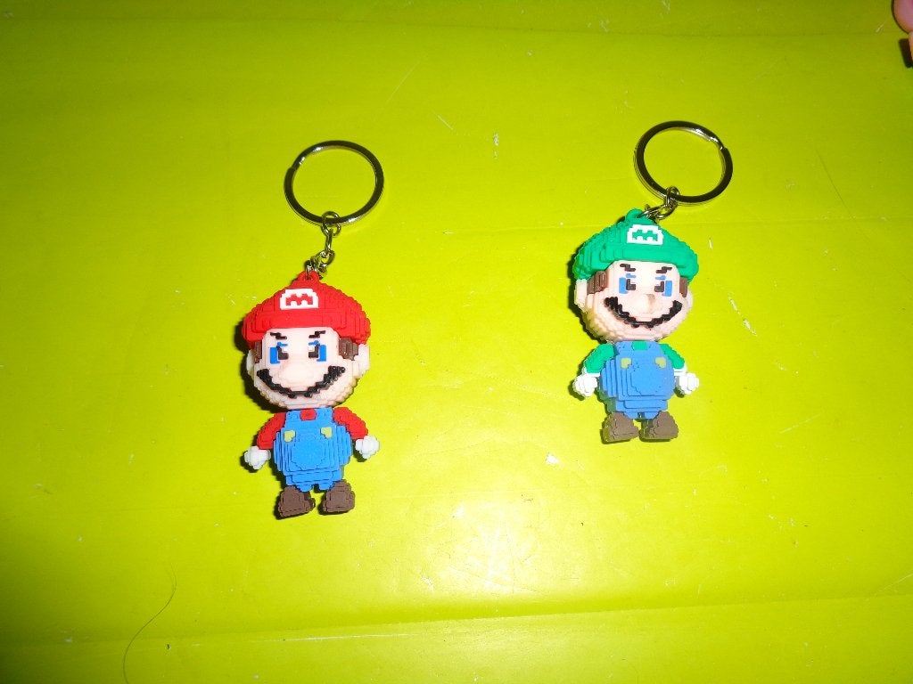 SLEUTELHANGER MARIO OF LUIGI €1,50 PER STUK!, Ophalen, Zo goed als nieuw, Knuffel of Figuurtje