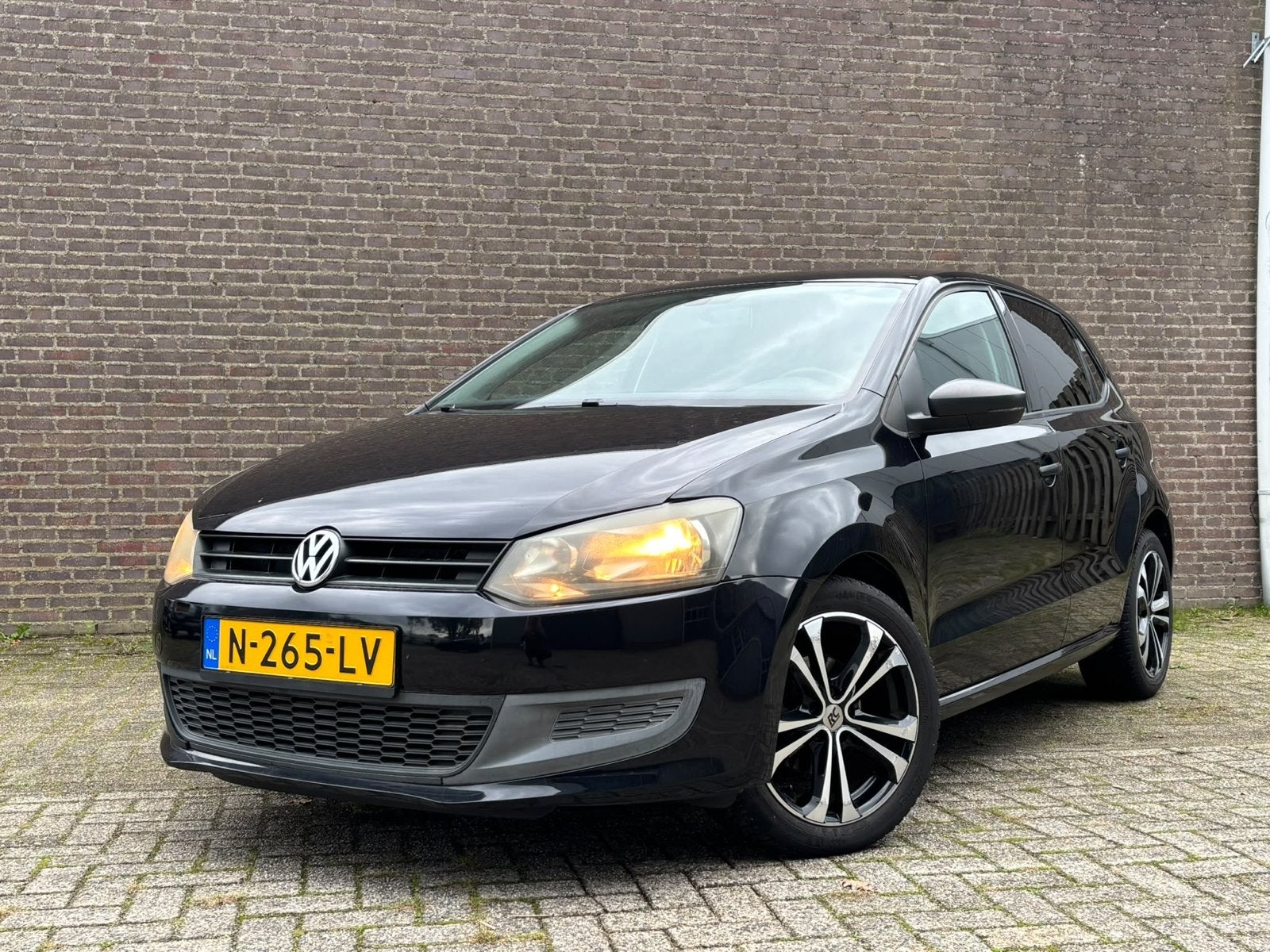 Volkswagen Polo 1.2 51KW 2010 Zwart, Auto's, Voorwielaandrijving, 967 kg, 1198 cc, Zwart