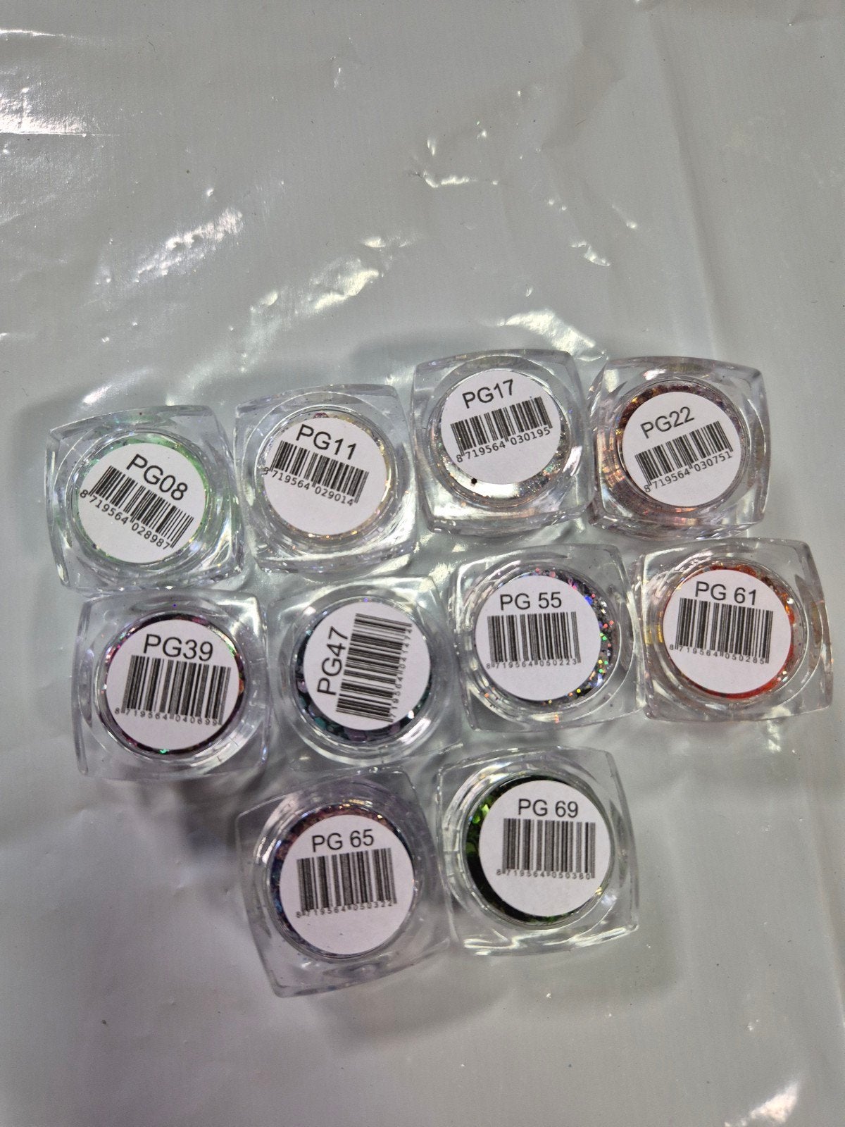 Nieuw 10x Urban Nails Pixie Glitters pakket 1, Overige kleuren, Nieuw, Ophalen of Verzenden, Handen en Nagels