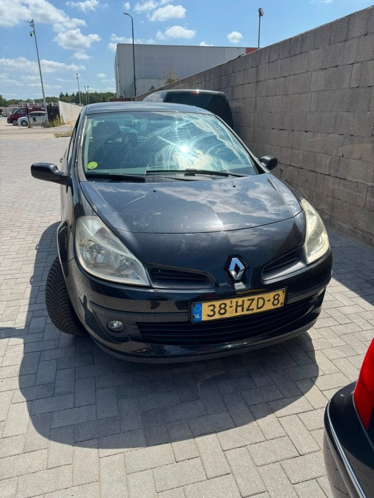 Renault Clio 1.2 16V 55KW 5-DRS E4 2009 Zwart, Auto's, Voorwielaandrijving, 535 kg, 74 pk, 4 cilinders