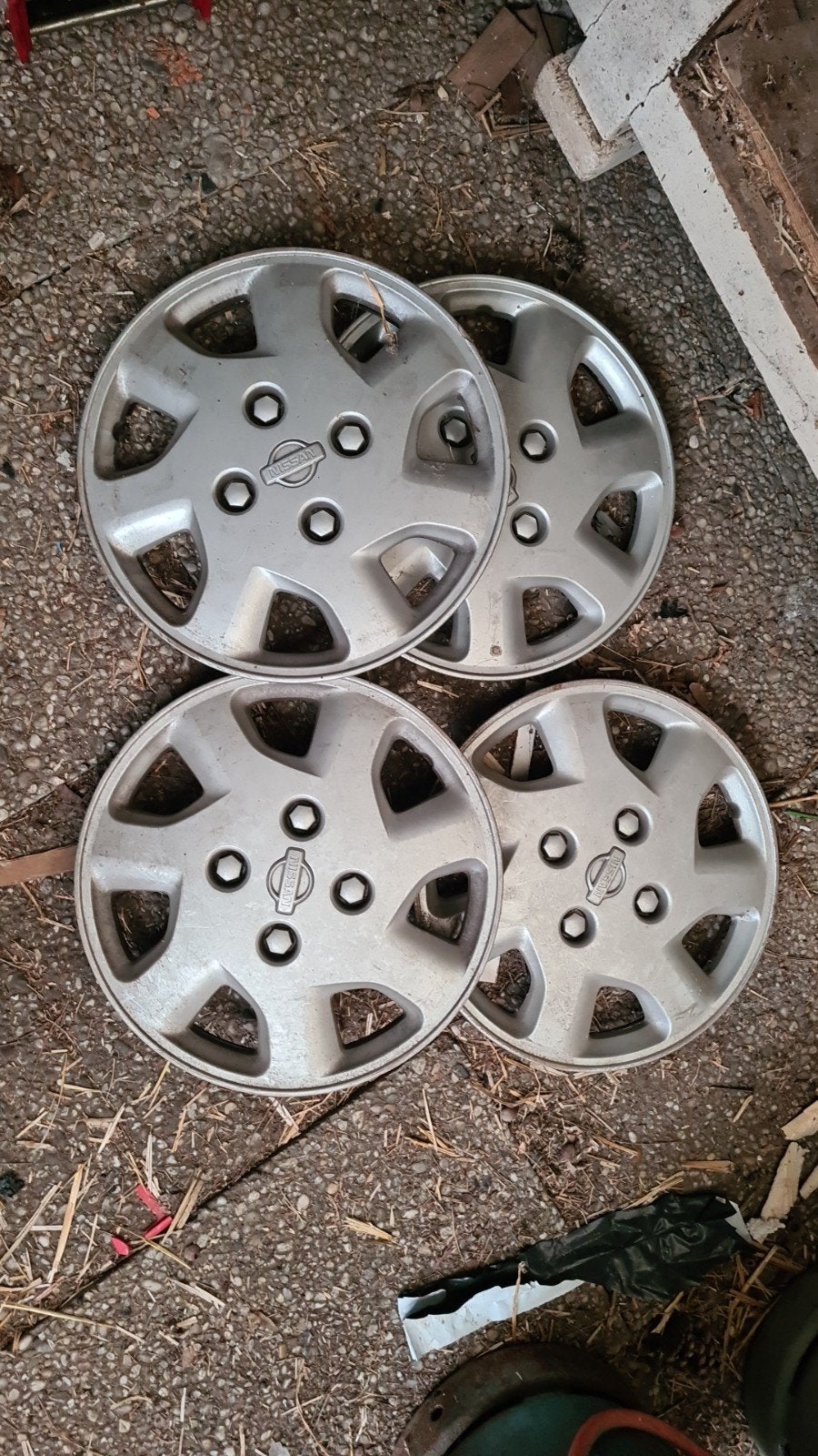 Set van 4 Nissan wieldoppen 40315-2F005 14 inch, Ophalen of Verzenden, Gebruikt