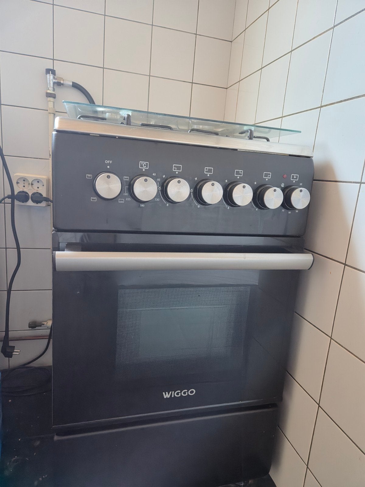 Wiggo gasfornuis met oven - Zo goed als nieuw, Ophalen, 4 kookzones, Zo goed als nieuw, Gas