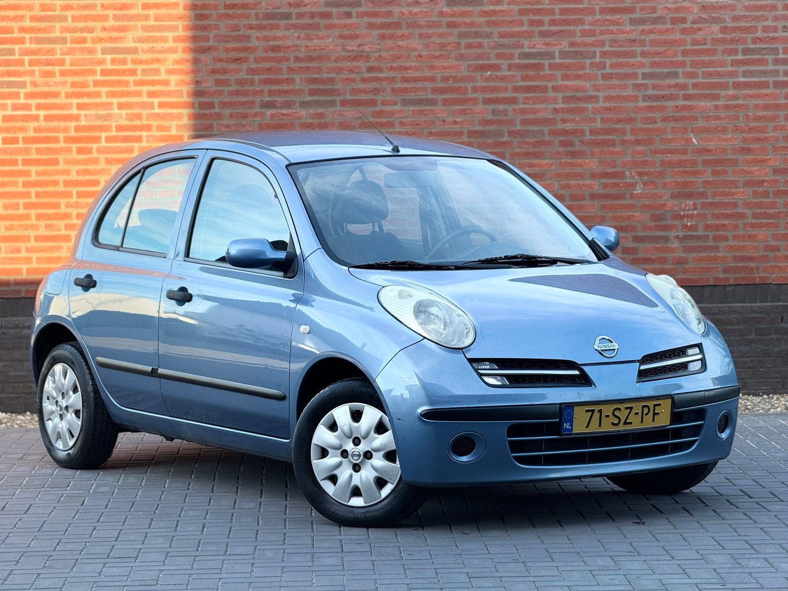 Nissan Micra Visia 1.2 48KW 5DR Airco 2006 Nap, Auto's, Dealer onderhouden, Stof, 40 €/maand, 4 cilinders