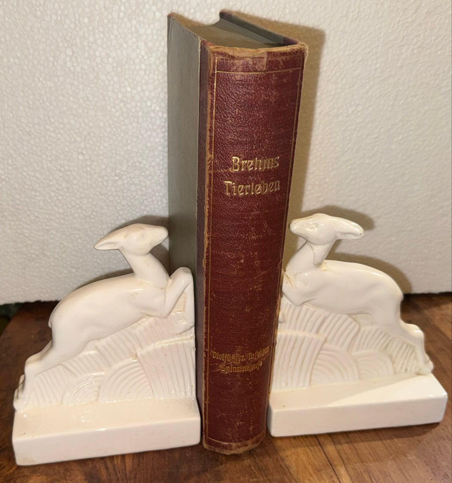 Vintage porseleinen boekensteunen met hertenmotief, Ophalen of Verzenden