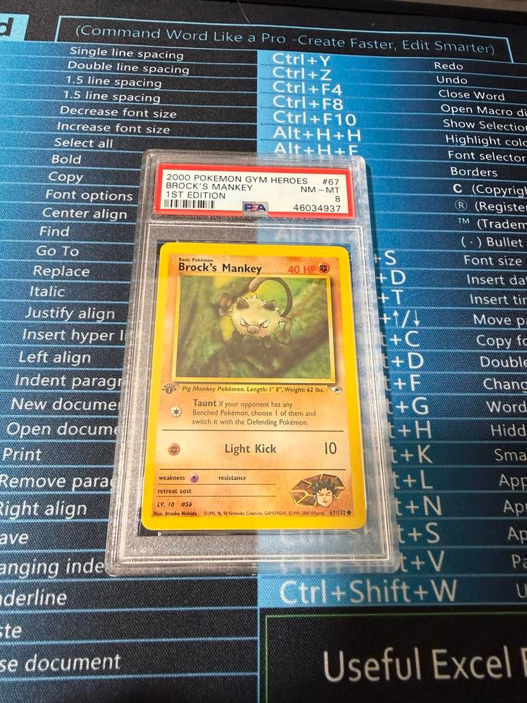 Pokémon Brock's Mankey 2000 Gym Heroes 1st Edition PSA 8, Ophalen of Verzenden, Gebruikt, Losse kaart