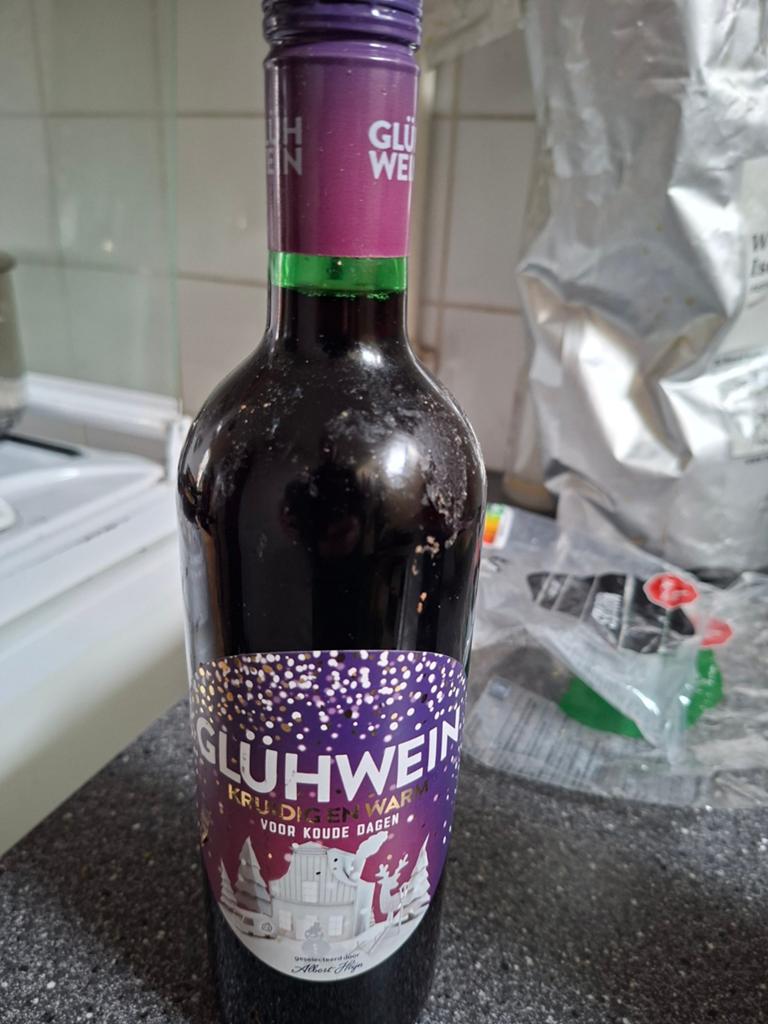 Fles gluhwein kruidig en warm, Ophalen