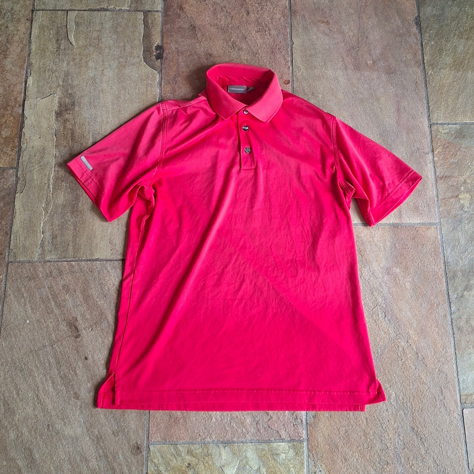 Ashworth golfpolo in fel roze/koraal – maat M, Sport en Fitness, Golf, Ophalen of Verzenden, Zo goed als nieuw, Kleding, Overige merken