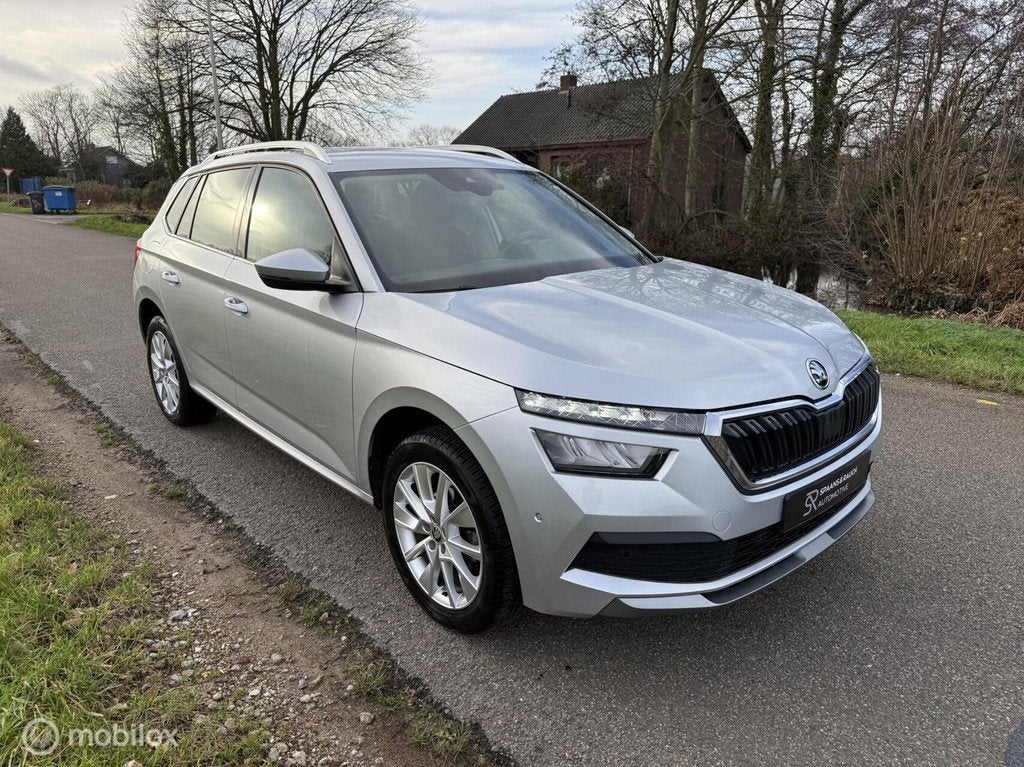 Skoda Kamiq 1.0 TSI Business Ed / Trekhaak / Virtual / Navi, Stof, Gebruikt, Zwart, Automatische klimaatregeling