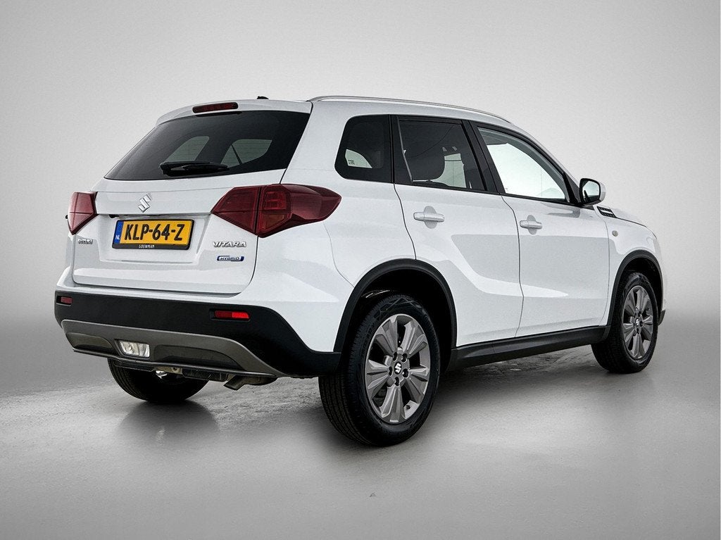 Suzuki Vitara 1.4 Boosterjet Select Smart Hybrid (bj 2023), Auto's, 12 maanden, Stof, Gebruikt, Wit