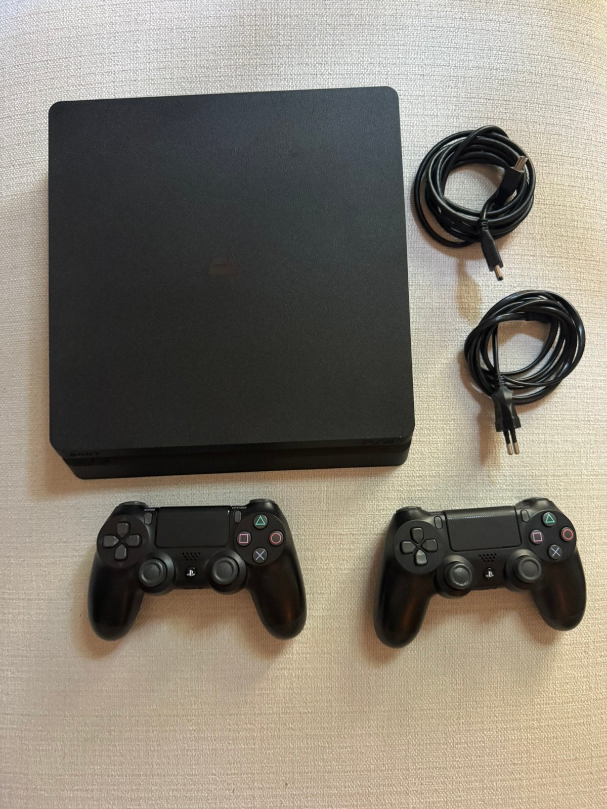 PS4 Slim 1TB + 2 originele controllers + 9 games, Ophalen, Zo goed als nieuw, Met 2 controllers, Slim