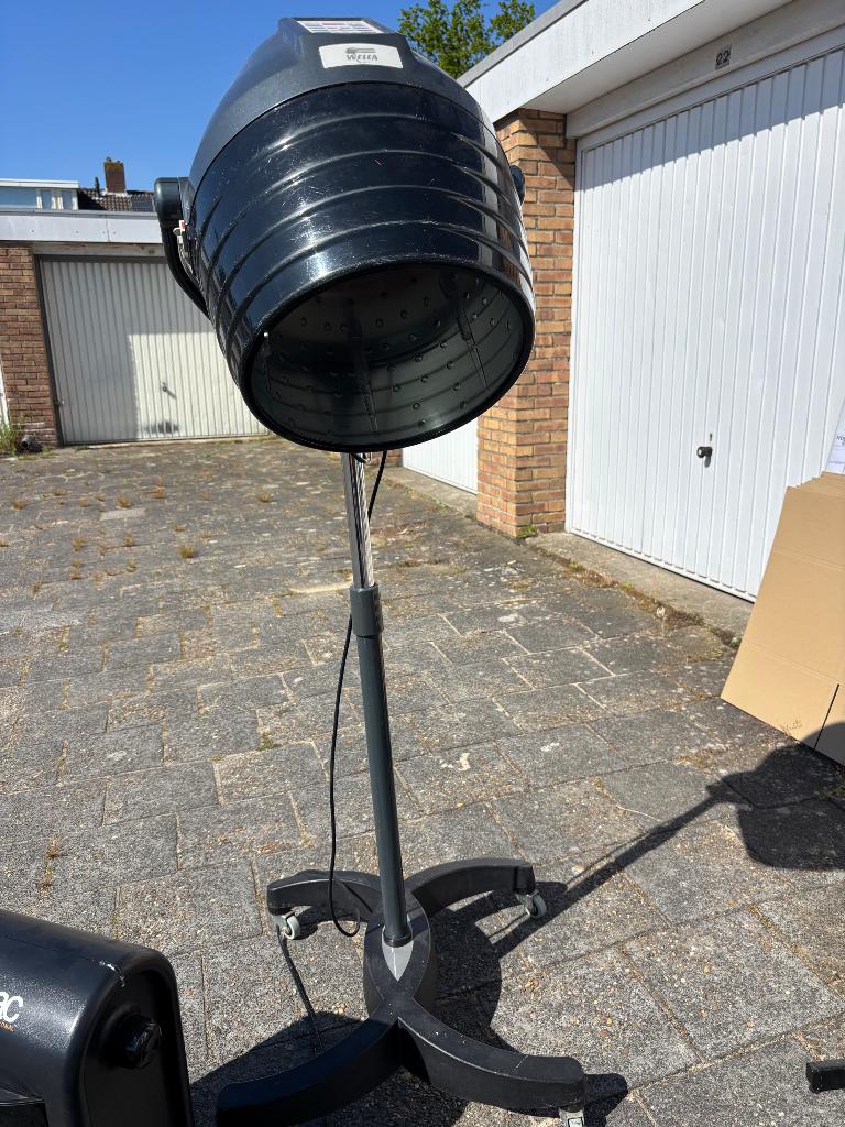 Droogkap kapsalon, Ophalen
