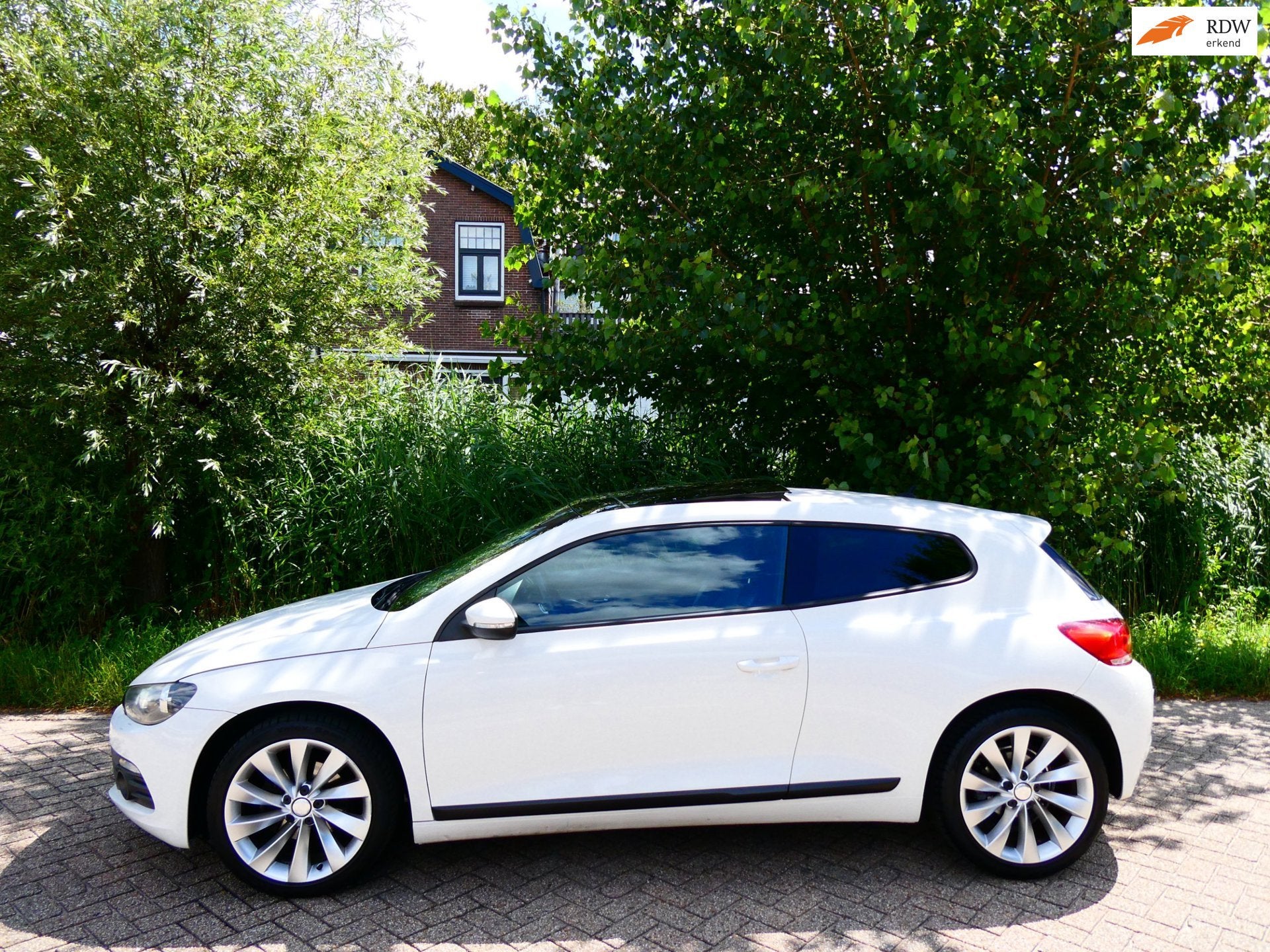 Volkswagen Scirocco 1.4 TSI 122pk Clima Cruise PDC Panorama, Auto's, Voorwielaandrijving, Euro 5, Gebruikt, 4 cilinders