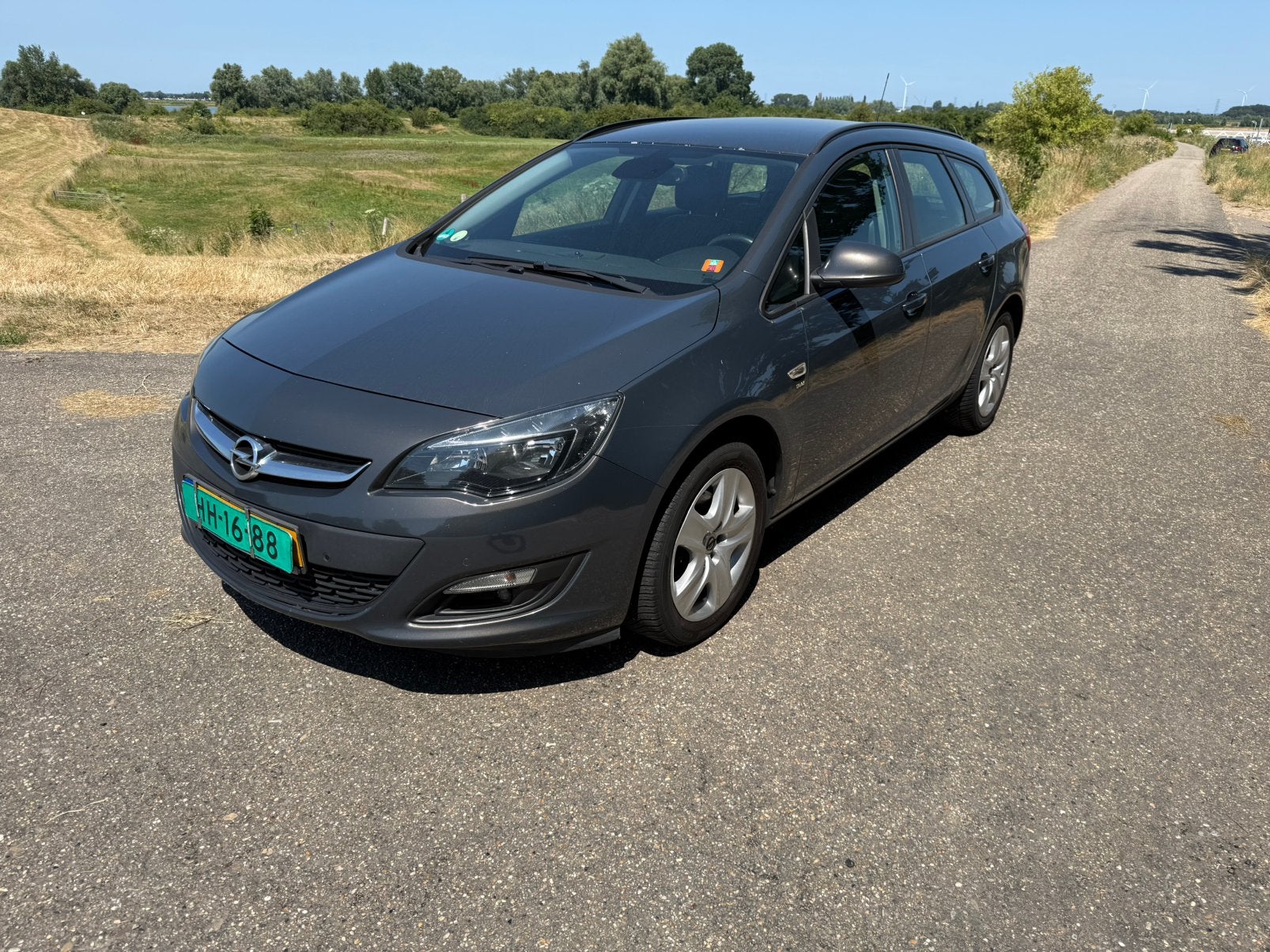 Opel Astra 1.6 Cdti 81KW Sports Tourer 2014 Grijs Airco enz, Auto's, Opel, Voorwielaandrijving, 730 kg, 4 cilinders, Leder en Stof