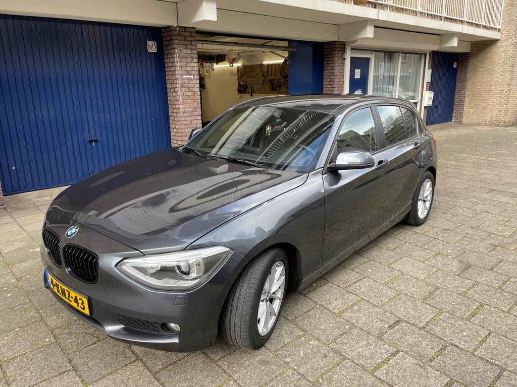 BMW 1-Serie 114i Business Edition 5 Deurs Clima/Navi/NAP, Auto's, BMW, Particulier, 1-Serie, ABS, Airbags, Airconditioning, Alarm