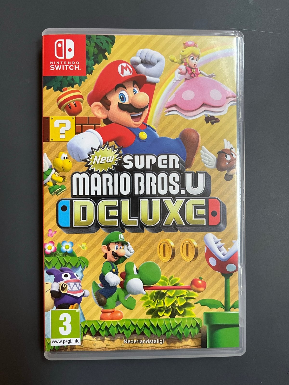 New Super Mario Bros. U Deluxe - Nintendo Switch, Spelcomputers en Games, Eén computer, Ophalen of Verzenden, Zo goed als nieuw