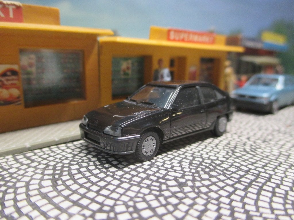 Opel Kadett E Gsi Herpa zwart Nieuw in originele verpakking, Ophalen of Verzenden, Zo goed als nieuw, Auto, Herpa