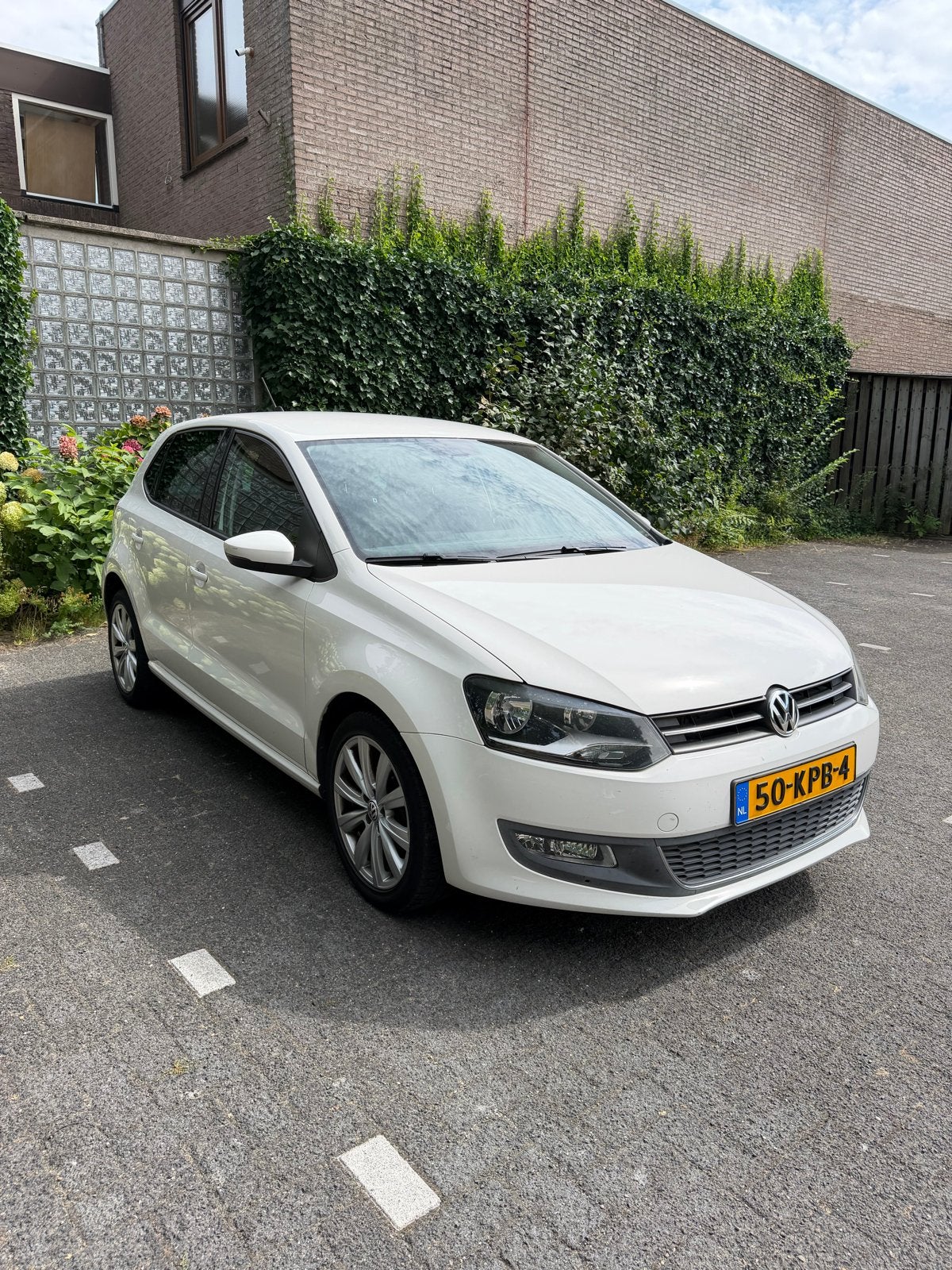 Volkswagen Polo 1.4 16V FSI 63KW 2010 Wit, Auto's, Voorwielaandrijving, 970 kg, Stof, 40 €/maand