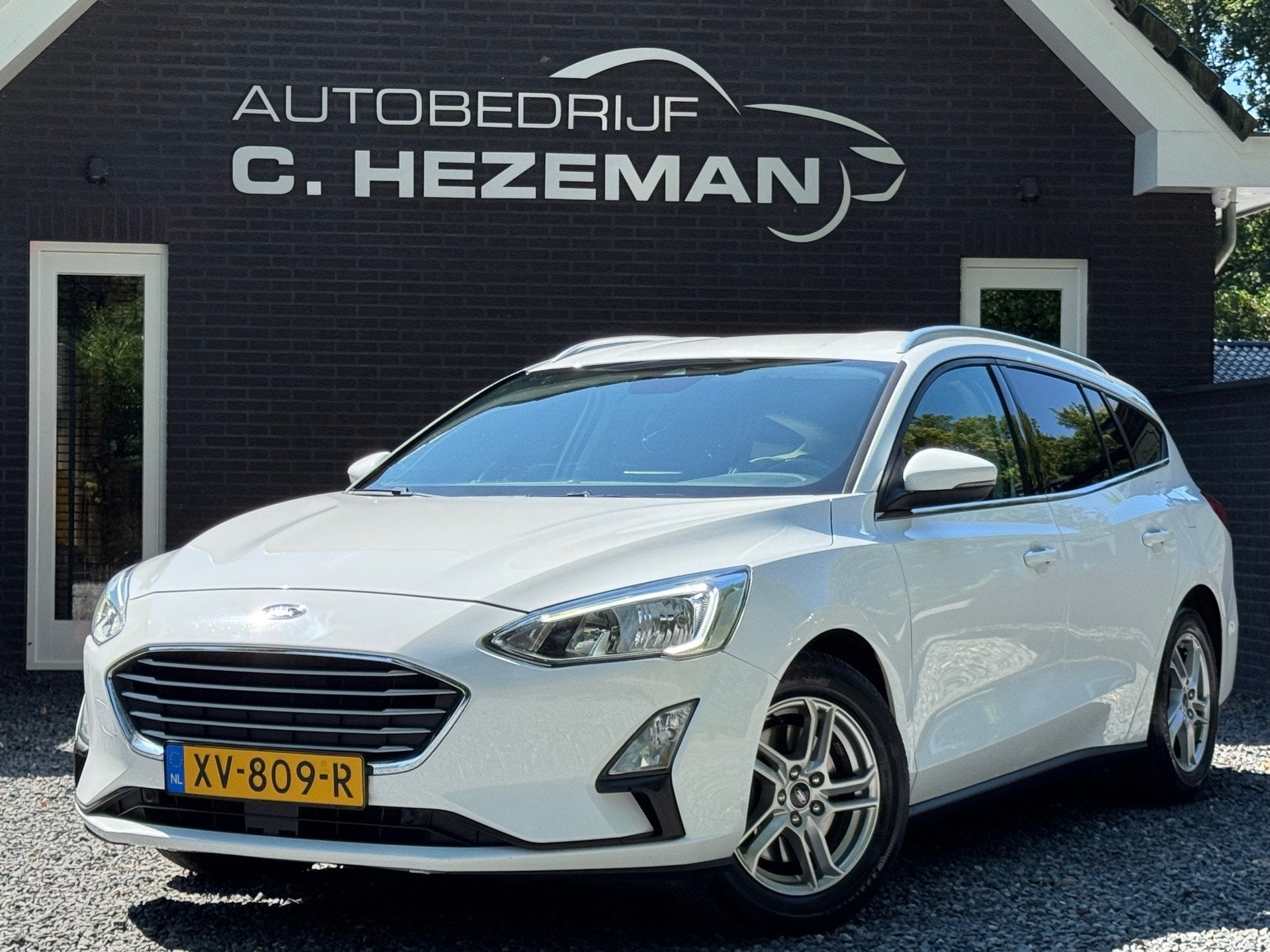 Ford Focus Wagon 1.0 125PK Edition Business Cruise Climate C, Auto's, Gebruikt, Lichtsensor, 1283 kg, Wit