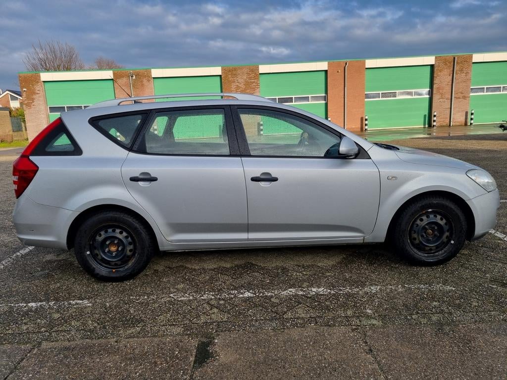 Kia cee'd 1.4 sporty wagon, Auto's, Kia, Voorwielaandrijving, Stof, 4 cilinders, Elektrische ramen