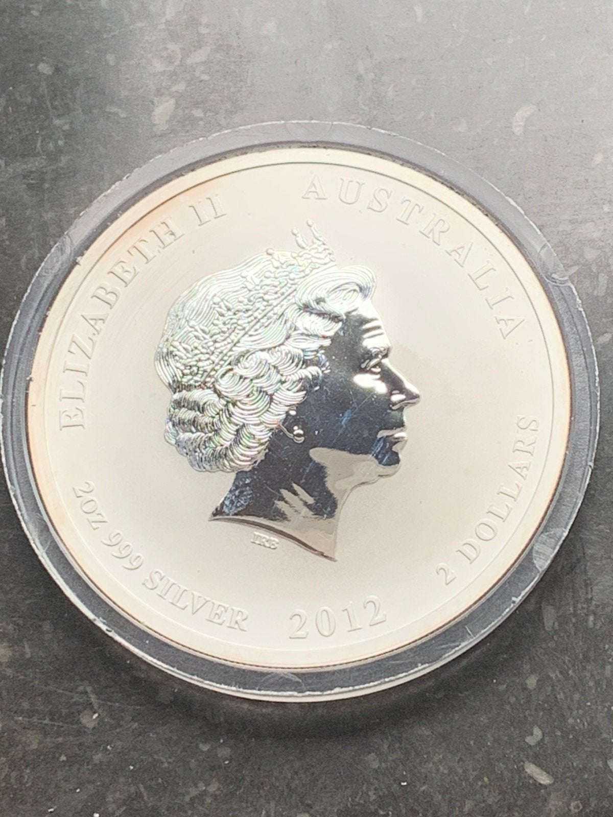 Prachtige zilveren munt 2 oz year of the dragon 2012 schaars, Ophalen of Verzenden, Zilver