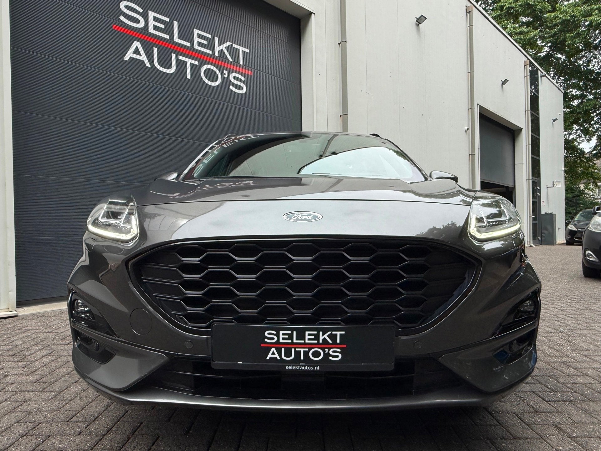 Ford Kuga 2.5 PHEV ST-Line X 224 Pk Cruise/Climate/Leder/Alc, Auto's, Ford, Gebruikt, Zwart, 4 cilinders, Origineel Nederlands