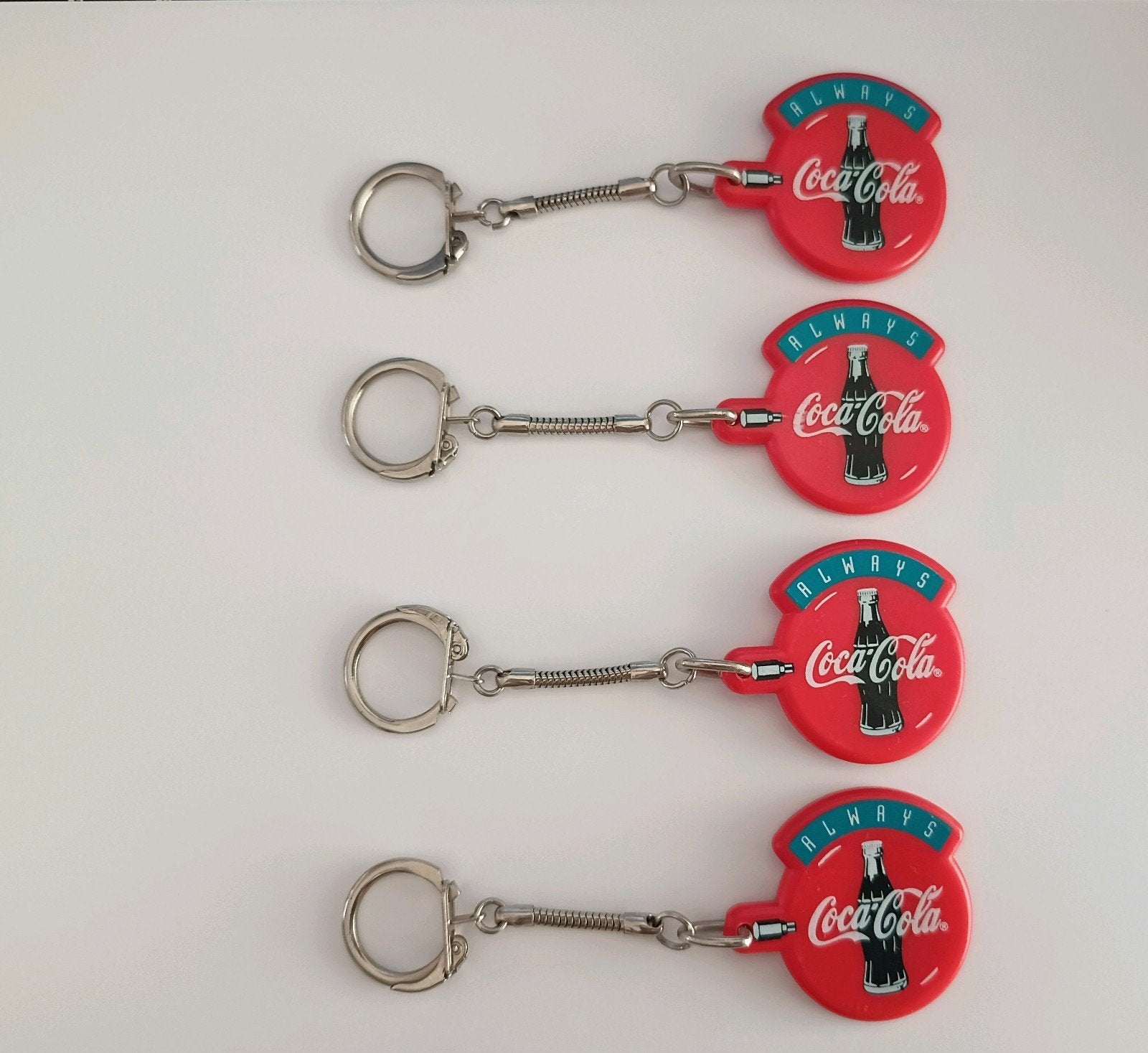 Partij handel 7 Sleutelhangers met Always Coca Cola logo, Verzenden, Nieuw, Overige typen