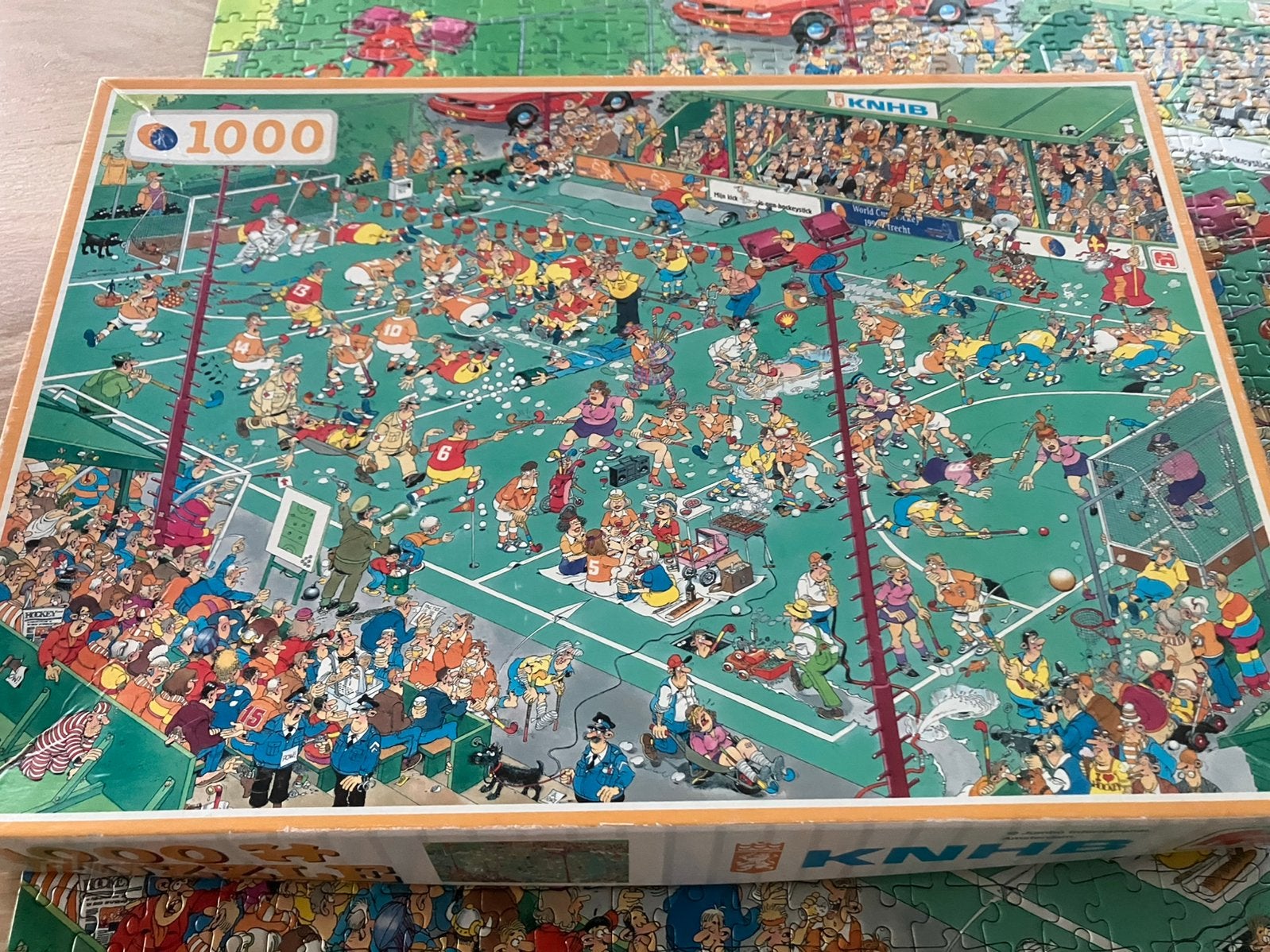 Verzamel item Jan van Haasteren 100 jaar knhb hockey puzzel, Ophalen of Verzenden, 500 t/m 1500 stukjes, Zo goed als nieuw