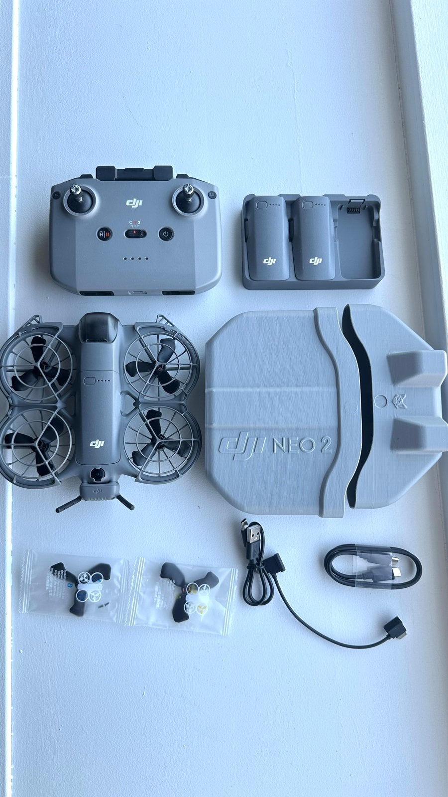 DJI Neo 2 Fly More Combo + Remote controller + Care Refresh, Ophalen, Zo goed als nieuw