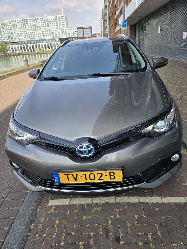 Toyota Auris Touring Sports1.8 Hybrid Dynamic Automaat, Auto's, Toyota, Euro 6, Metallic lak, Alcantara, Origineel Nederlands