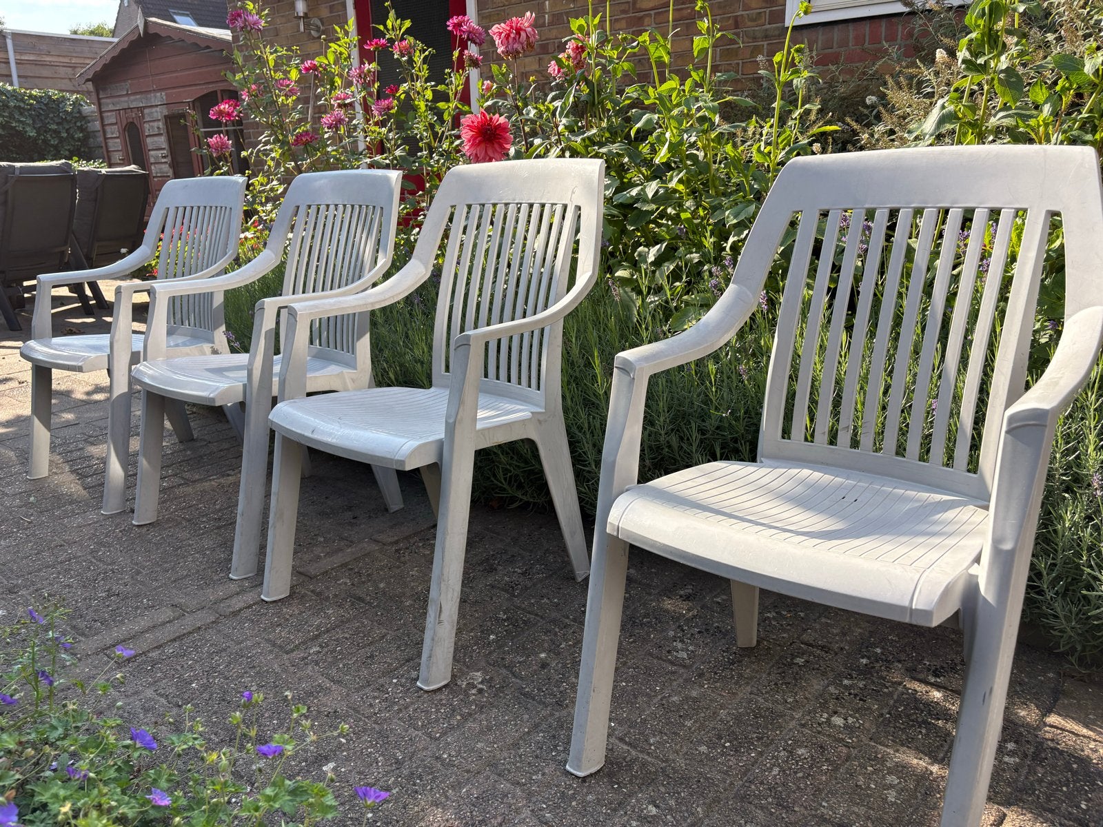 Grijze plastic tuinstoelen - Set van 4, Tuin en Terras, Tuinstoelen, Ophalen, Gebruikt, Plastic, Stapelbaar
