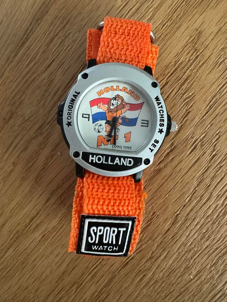 Oranje Holland sporthorloge - Nieuwe batterij nodig, Ophalen of Verzenden, Zo goed als nieuw, Oranje, Jongen of Meisje