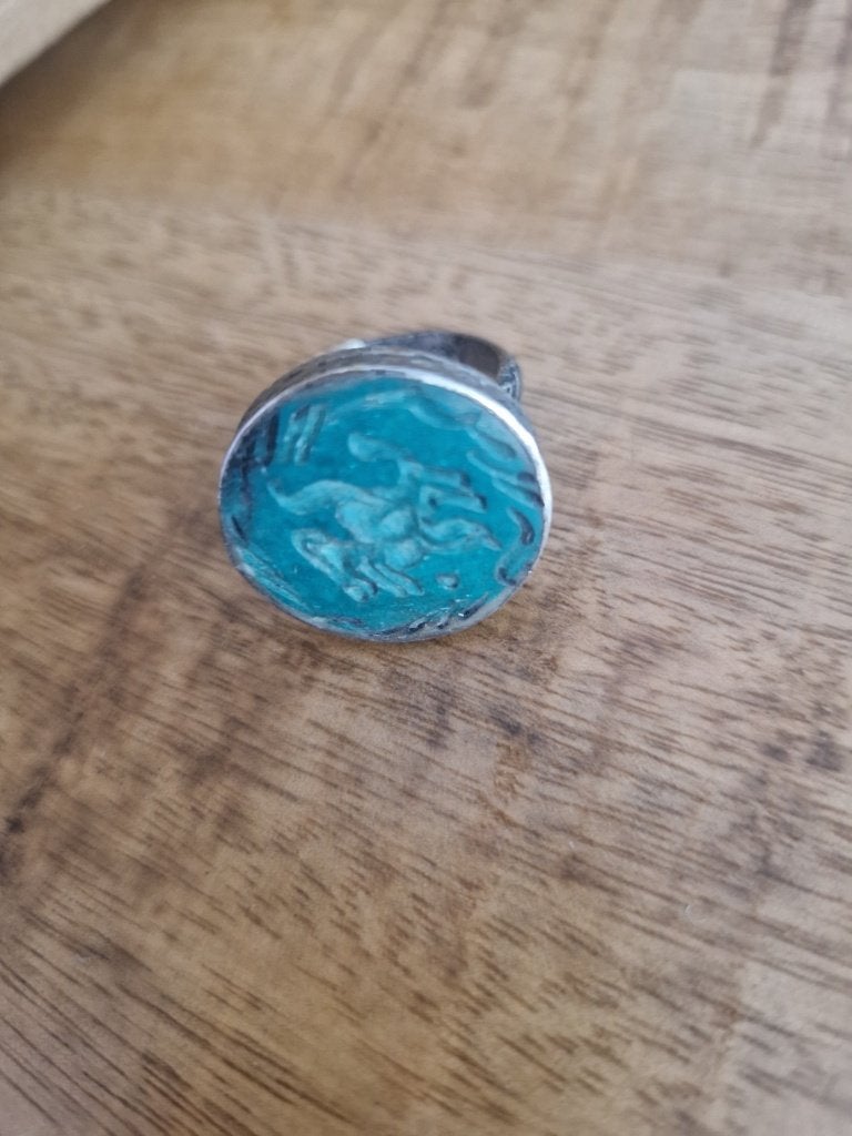 Tibetaans zilveren zegelring maat 18. Met turquoise.