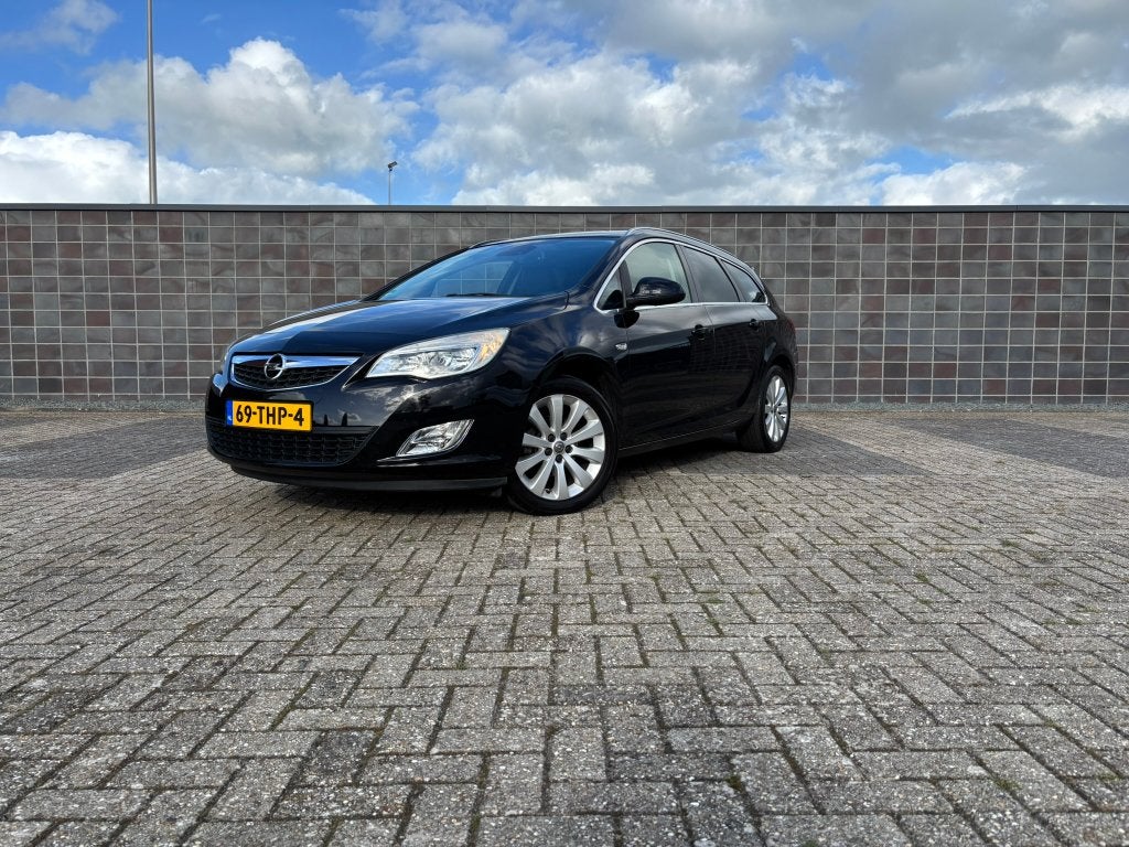 Opel Astra 1.4 74KW ST 2012 Zwart, Auto's, Voorwielaandrijving, Parkeersensor, 101 pk, 4 cilinders