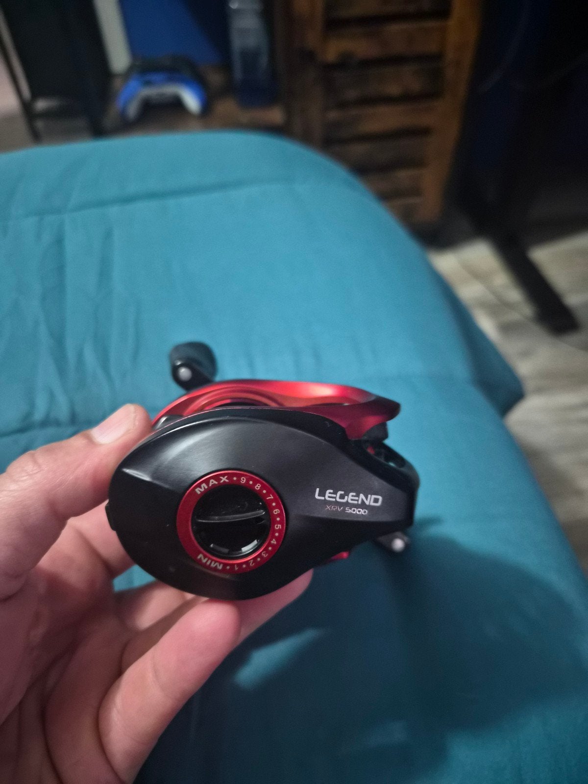 Baitcaster reel zo goed als nieuw met gevlochten draad, Ophalen of Verzenden