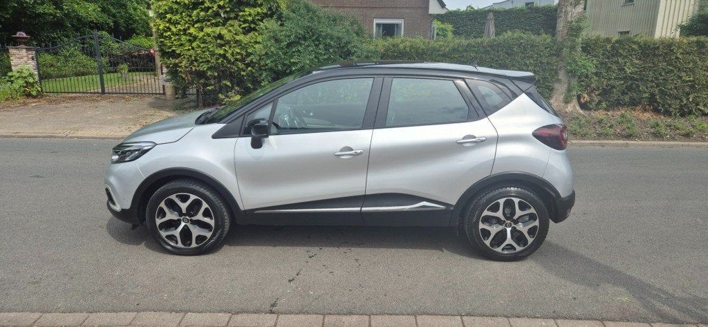Renault CAPTUR 0.9 TCe Intens*trekhaak*stoelverw*ECC*Navigat, Auto's, Voorwielaandrijving, 898 cc, Gebruikt, Met garantie (alle)