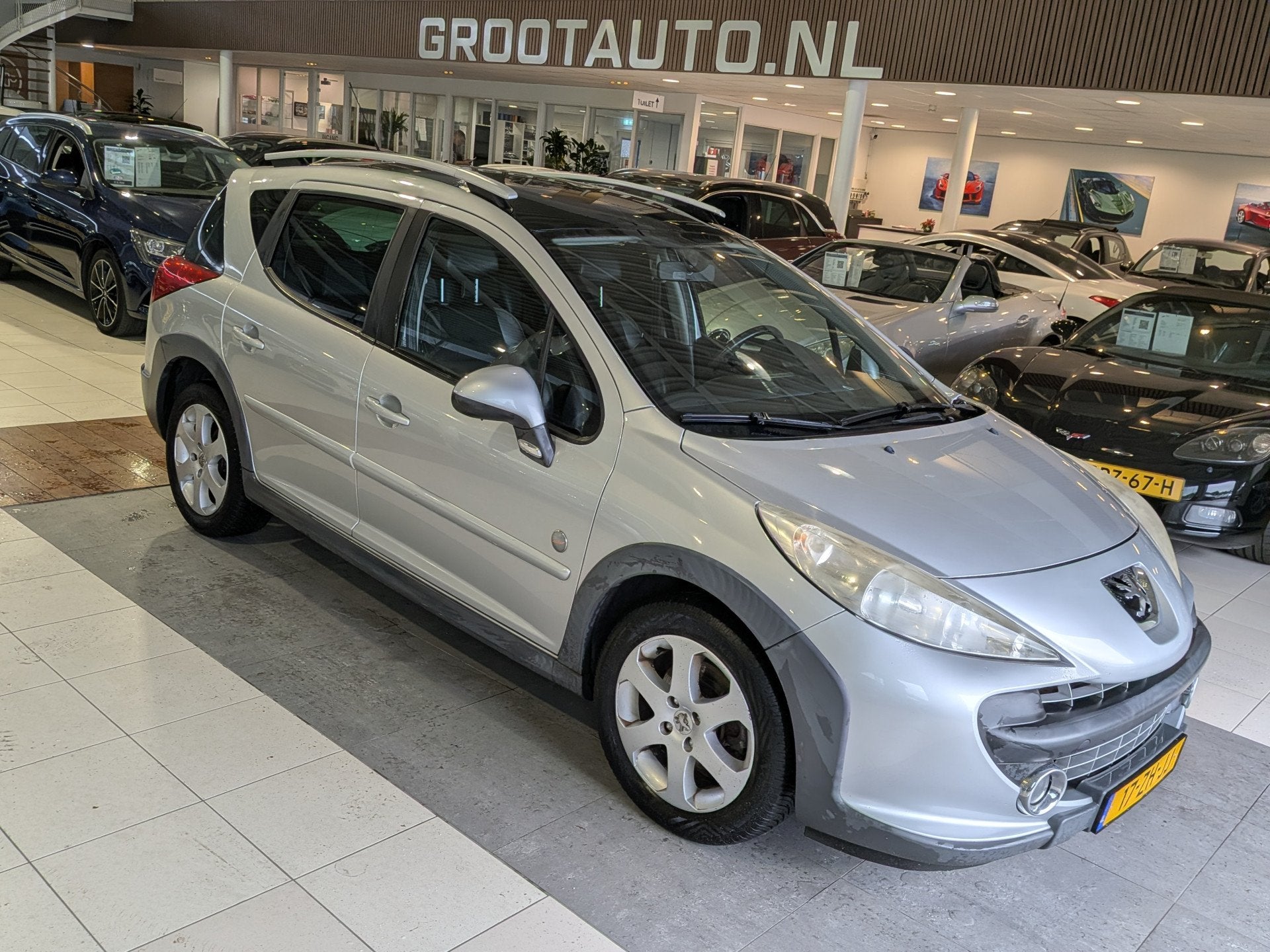 Peugeot 207 SW Outdoor 1.6 VTi XS Panoramadak, Airco, Stuurb, Zwart, 4 cilinders, Leder en Stof, 1110 kg