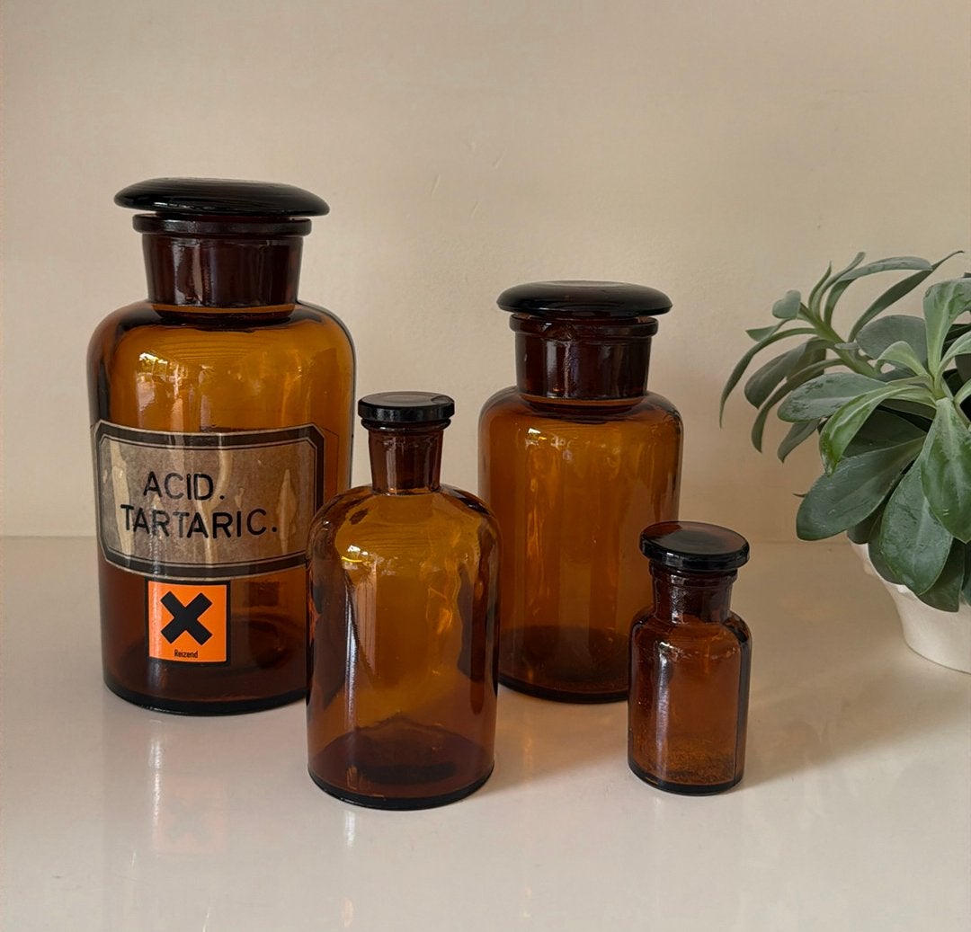 4 amberkleurige apothekersflessen / gifflessen, Ophalen of Verzenden