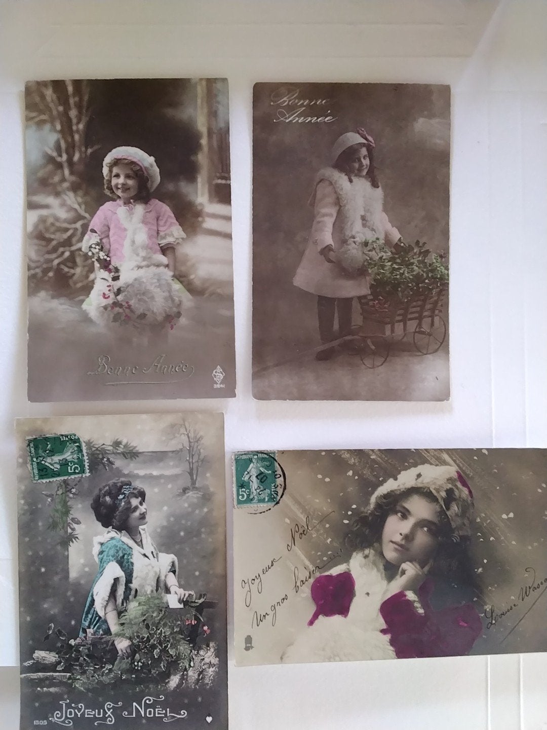 Set van 4 antieke kerst- en nieuwjaarskaarten, Ophalen of Verzenden, Voor 1920, Gelopen